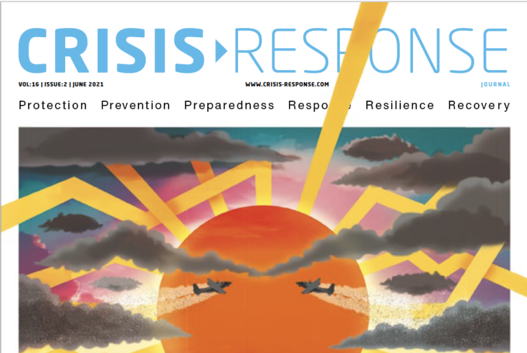 Cover of Crisis Response Journal with graphic of planes flying across angry looking sunangry