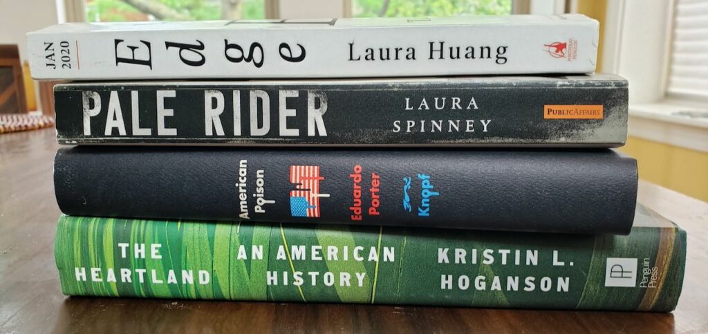 Pile of books: Edge, Pale Rider, American Poison, Heartland