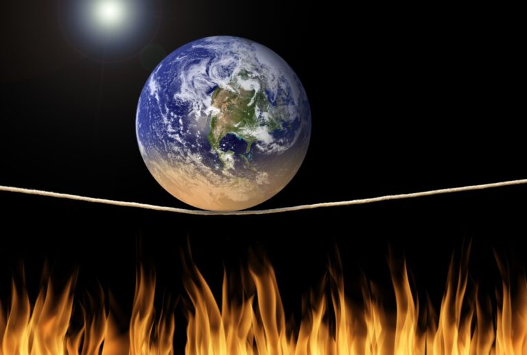Earth rolling on tightrope above flames