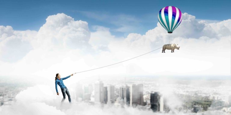 woman on a hill holding a rhino flying like a kite through clouds over a city