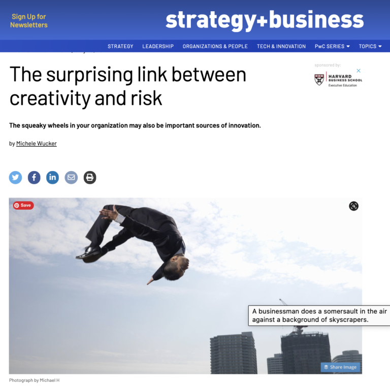 Screenshot of strategy+business article headline and photo of man in suit doing a back flip against skyline backdrop